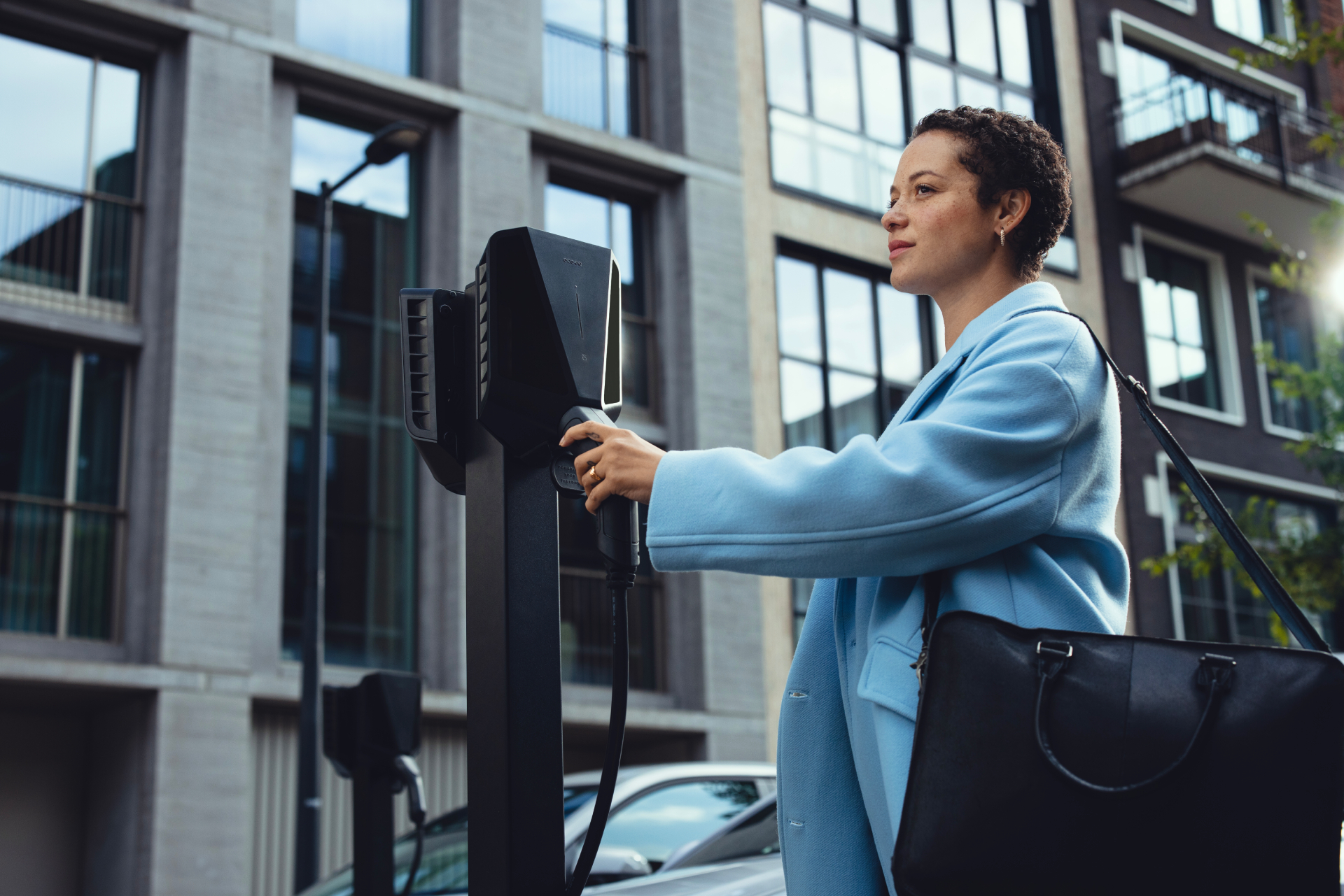 commercial-evcharging-hand